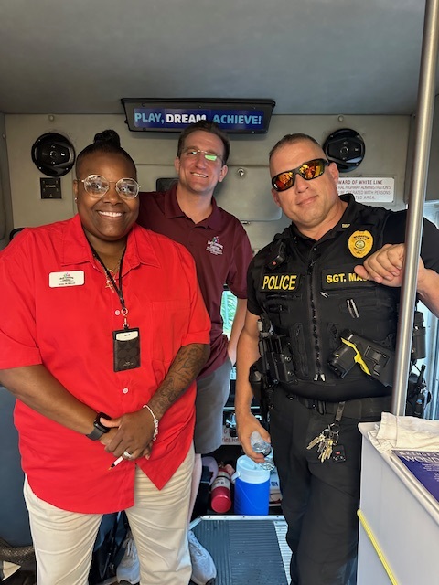 Community members smiling at the event