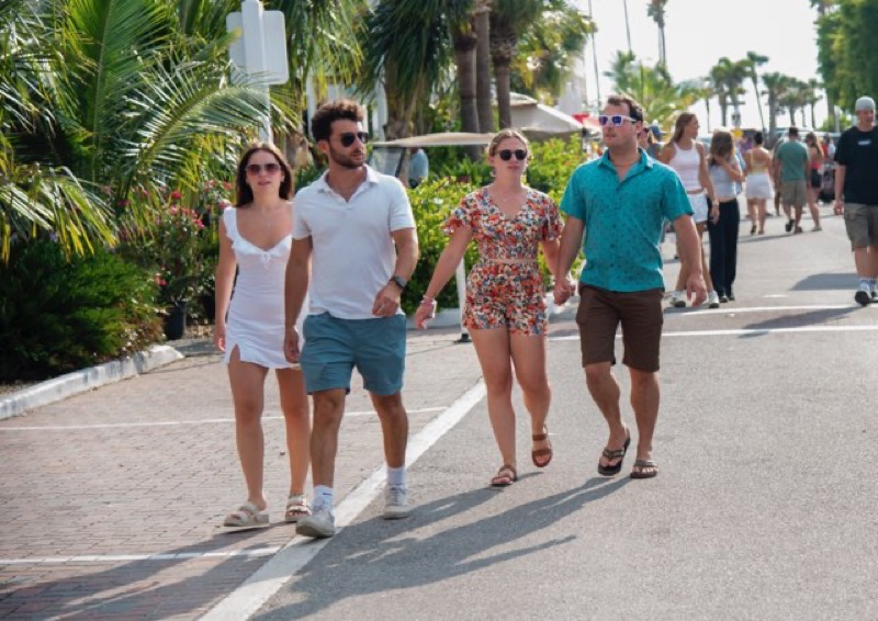 Couples strolling down Bridge Street
