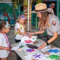 Park ranger doing crafts with kids