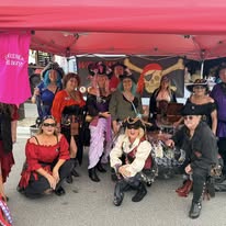 Group in pirate costumes at themed event