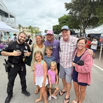 Police officer with families at the event