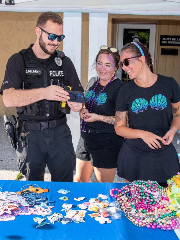 Local police enjoying the event with vendors