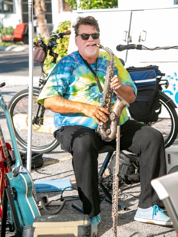 Saxophone player performing live on Bridge Street